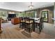 Spacious living room and dining area with an open floor plan and many windows at 1050 Signal Pointe, Alpharetta, GA 30005