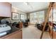 Functional office space with built-in shelves, desk, and natural light from the window at 1050 Signal Pointe, Alpharetta, GA 30005