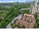 Stunning aerial view showcases a leafy community and city skyline backdrop at 3777 Peachtree Ne Rd # 1536, Atlanta, GA 30319