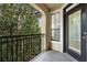 Private balcony with railing and views of the outdoor landscaping at 3777 Peachtree Ne Rd # 1536, Atlanta, GA 30319