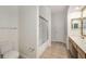 Bright bathroom featuring a shower-tub combo with a glass enclosure and tile flooring at 3777 Peachtree Ne Rd # 1536, Atlanta, GA 30319