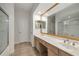 Bright bathroom featuring double sinks with ample counter space and large mirror at 3777 Peachtree Ne Rd # 1536, Atlanta, GA 30319