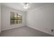 Inviting bedroom features a ceiling fan and neutral carpet at 3777 Peachtree Ne Rd # 1536, Atlanta, GA 30319