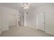 Bright bedroom with a ceiling fan, neutral carpet and crown moulding at 3777 Peachtree Ne Rd # 1536, Atlanta, GA 30319