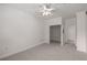 Spacious bedroom with ceiling fan and neutral carpet at 3777 Peachtree Ne Rd # 1536, Atlanta, GA 30319
