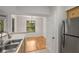 Kitchen featuring stainless steel appliances with an open view of the dining area at 3777 Peachtree Ne Rd # 1536, Atlanta, GA 30319
