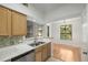 Charming kitchen with stainless steel dishwasher, and open view of dining area at 3777 Peachtree Ne Rd # 1536, Atlanta, GA 30319