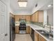 A kitchen featuring stainless steel appliances and sleek countertops at 3777 Peachtree Ne Rd # 1536, Atlanta, GA 30319