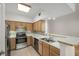 Well-lit kitchen featuring stainless steel appliances, and light countertops at 3777 Peachtree Ne Rd # 1536, Atlanta, GA 30319
