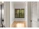 Bright living room featuring wood floors, natural light, and neutral paint at 3777 Peachtree Ne Rd # 1536, Atlanta, GA 30319