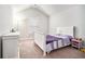 Cozy bedroom with neutral walls, carpet flooring, a dresser, and a window at 3780 Casual Ridge Way, Loganville, GA 30052