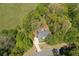 Aerial view of the home with a private backyard and extensive wooded property at 402 Glenhurst Trce, Canton, GA 30115