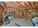 Spacious unfinished basement with exposed beams, ductwork, and plenty of room for customization at 402 Glenhurst Trce, Canton, GA 30115