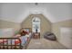 Bedroom with carpet, twin bed, neutral walls, natural light, and a gray beanbag chair at 402 Glenhurst Trce, Canton, GA 30115