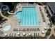 Relax and unwind at the community pool, featuring a slide and seating, perfect for cooling off on a hot day at 402 Glenhurst Trce, Canton, GA 30115