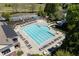 A view of the community pool with a slide, seating, and landscaped surroundings, perfect for relaxation and recreation at 402 Glenhurst Trce, Canton, GA 30115