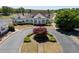 Stunning home exterior with circular drive and lush landscaping at 402 Glenhurst Trce, Canton, GA 30115