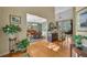 Elegant foyer with hardwood floors, leading to a dining room, stairway, and adjacent living spaces at 402 Glenhurst Trce, Canton, GA 30115