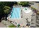 Aerial view of a large community pool with lounge chairs and a splash pad at 402 Glenhurst Trce, Canton, GA 30115