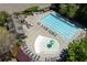 Aerial view of a community pool and splashpad with lounge chairs at 402 Glenhurst Trce, Canton, GA 30115