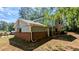 View of the back of the house with siding and brick at 4402 Sebring Walk, Decatur, GA 30034