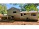 Spacious backyard view of the home with siding and a patio at 4402 Sebring Walk, Decatur, GA 30034
