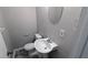 Cozy half bathroom features a pedestal sink and neutral color palette at 4402 Sebring Walk, Decatur, GA 30034