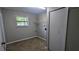 Clean bedroom features a window, closet and vinyl flooring at 4402 Sebring Walk, Decatur, GA 30034