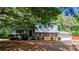 Charming two-story home featuring a brick facade, light siding, and a covered front entrance at 4402 Sebring Walk, Decatur, GA 30034