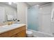 Well lit bathroom featuring a shower and tub combo with a glass sliding door at 1150 Collier Nw Rd # E3, Atlanta, GA 30318