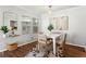 Bright dining area featuring modern decor, hardwood floors, and a stylish table setting at 1150 Collier Nw Rd # E3, Atlanta, GA 30318