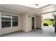 View of building entrance with gray door, large window, and natural light from opening above at 1150 Collier Nw Rd # E3, Atlanta, GA 30318