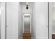 Bright hallway featuring dual storage closets and contemporary lighting at 1150 Collier Nw Rd # E3, Atlanta, GA 30318