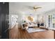 Inviting living room with hardwood floors, neutral decor, and a view into the hallway at 1150 Collier Nw Rd # E3, Atlanta, GA 30318