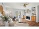 Cozy living room boasts a fireplace, built-in shelving, and access to the outdoor area at 1150 Collier Nw Rd # E3, Atlanta, GA 30318
