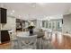 Open-concept dining area connects the kitchen, living room, and backyard at 737 St Charles Ne Ave, Atlanta, GA 30306