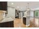 Modern kitchen with stainless steel appliances, granite countertops, and ample cabinet space at 737 St Charles Ne Ave, Atlanta, GA 30306