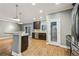 Modern kitchen with granite countertops, stainless steel appliances, and access to an outdoor space at 737 St Charles Ne Ave, Atlanta, GA 30306