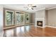Cozy living room features hardwood floors, a fireplace, and access to a balcony at 737 St Charles Ne Ave, Atlanta, GA 30306