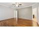 A spacious main bedroom features hardwood floors, neutral paint and a ceiling fan at 737 St Charles Ne Ave, Atlanta, GA 30306