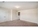 Bedroom with carpet, neutral walls, and a double door closet at 115 Oakwood Dr, Covington, GA 30016