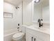 Bathroom features a shower and bathtub combination with sleek, modern fixtures at 1783 Big Valley Ln, Stone Mountain, GA 30083