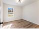 Bedroom featuring a window for natural light and modern ceiling light at 1783 Big Valley Ln, Stone Mountain, GA 30083