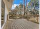 Newly constructed deck with wood railings overlooking a lush backyard, providing an inviting outdoor space at 1783 Big Valley Ln, Stone Mountain, GA 30083