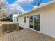 Expansive deck with sliding glass doors offers a seamless transition to indoor-outdoor living, perfect for gatherings at 1783 Big Valley Ln, Stone Mountain, GA 30083