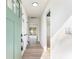 Bright hallway with hardwood flooring and a view to the back yard at 1783 Big Valley Ln, Stone Mountain, GA 30083