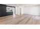 Spacious living room featuring hardwood floors, and modern finishes at 1783 Big Valley Ln, Stone Mountain, GA 30083