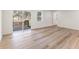 Bright living room featuring a sliding glass door leading to a wooden deck at 1783 Big Valley Ln, Stone Mountain, GA 30083