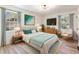 Serene main bedroom featuring elegant furnishings, soft lighting, and a calming color palette, a peaceful retreat at 1783 Big Valley Ln, Stone Mountain, GA 30083