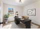 Bright and modern office space with sleek desk, natural light, and minimalist decor for a productive work environment at 1783 Big Valley Ln, Stone Mountain, GA 30083